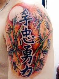 Bamboo Tree With Kanji Tattoo On Shoulder