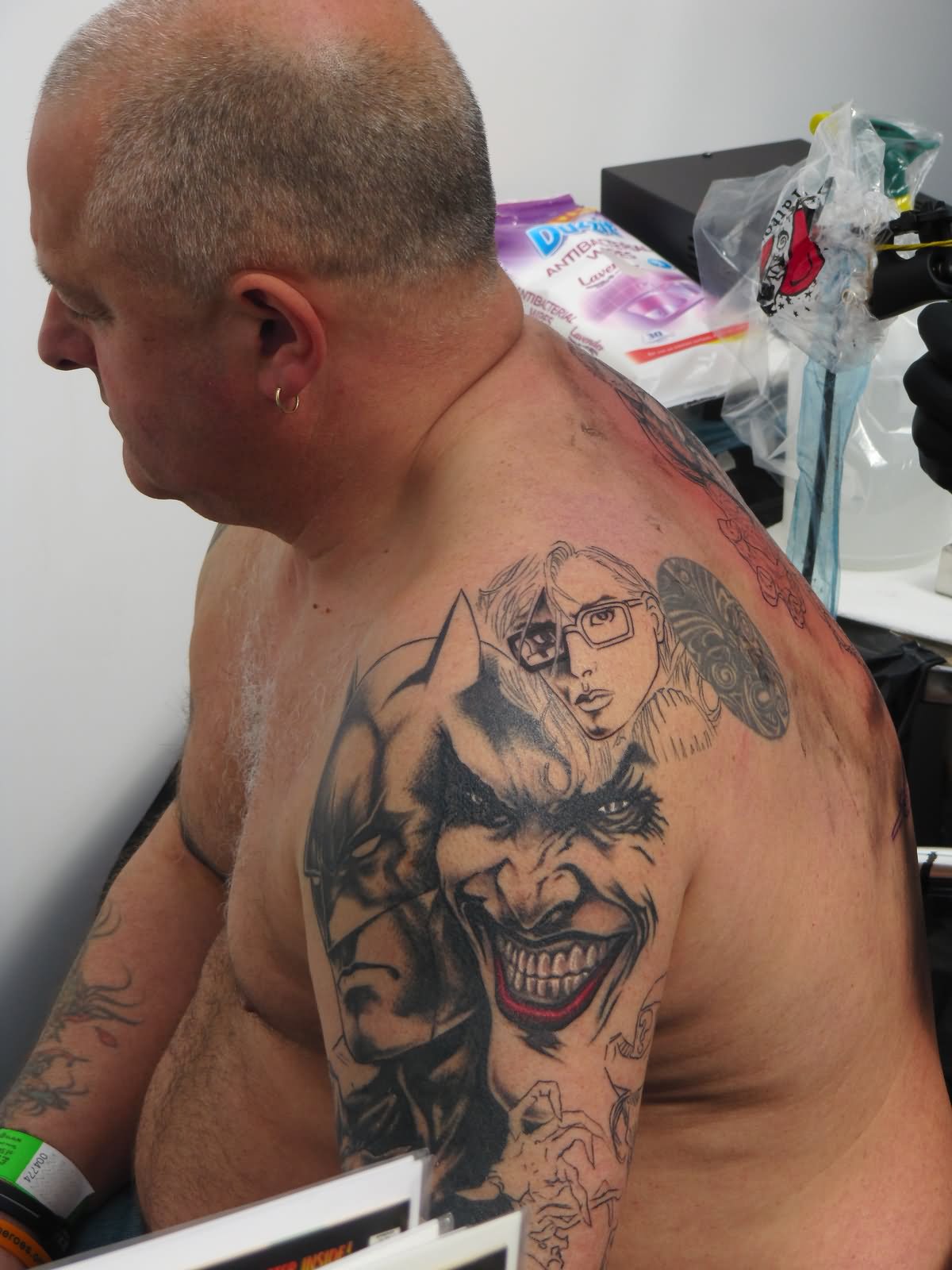 Batman Joker Tattoo On Man Left Half Sleeve