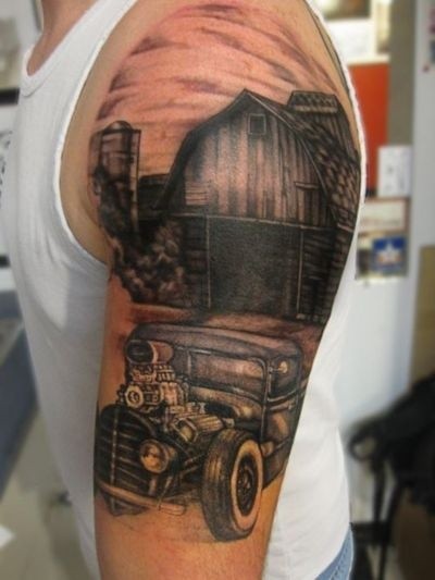 Black And Grey Car Tattoo On Left Sleeve