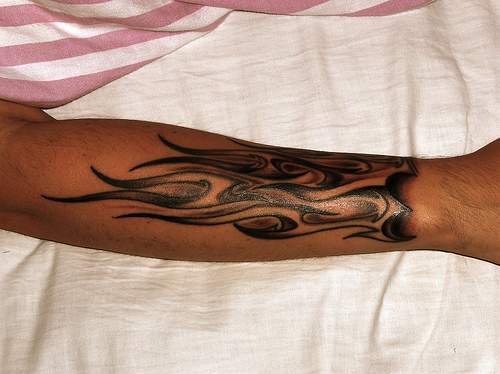 Black And Grey Fire And Flame Tattoo Design For Forearm