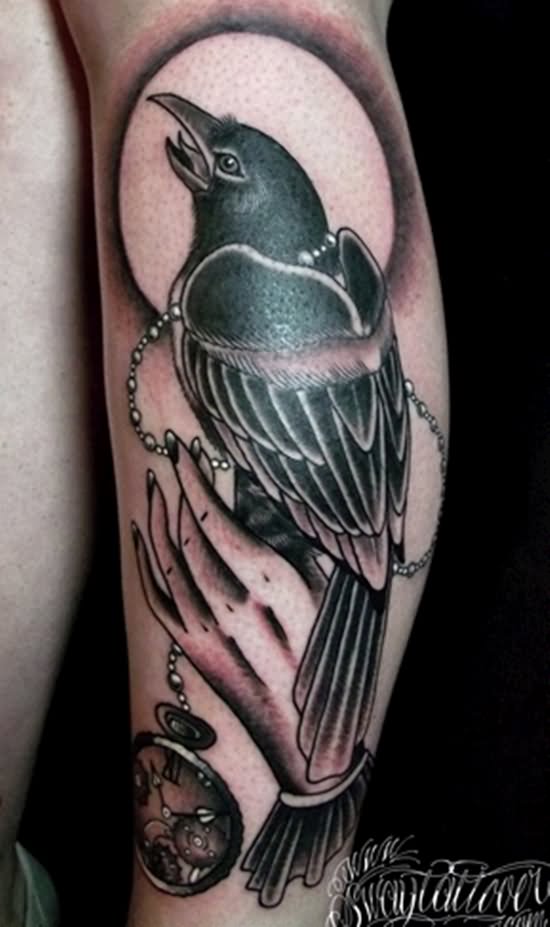 Black And Grey Traditional Raven Tattoo On Leg