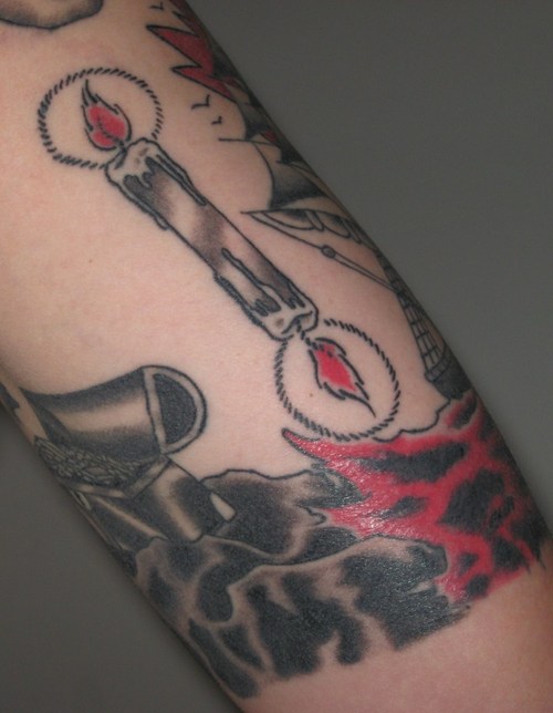 Black Candle Burning at Both Ends With Red Flames Tattoo