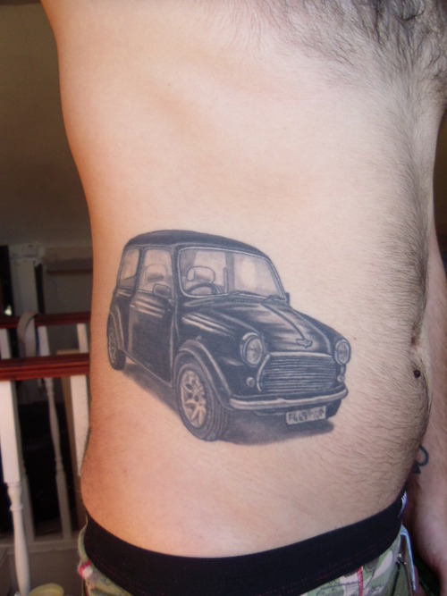 Black Car Tattoo On Man Side Rib