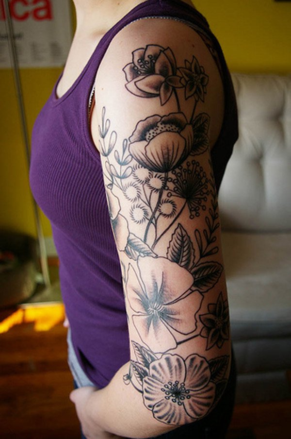 Black Ink Feminine Flowers Tattoo On Girl Left Half Sleeve