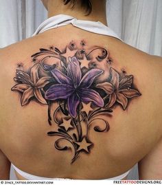 Black Ink Feminine Flowers Tattoo On Upper Back
