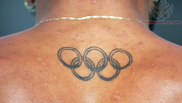 Black Ink Olympic Symbol Tattoo On Man Upper Back