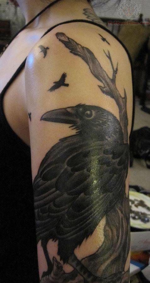 Black Ink Raven Tattoo On Left Half Sleeve