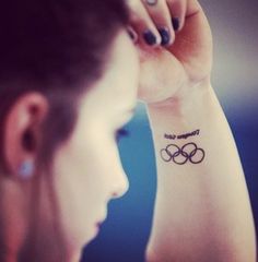 Black Olympic Symbol Tattoo On Girl Left Wrist