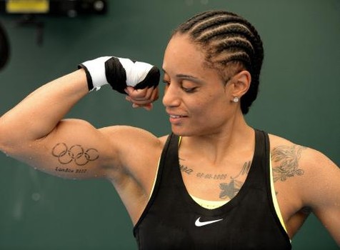 Black Olympic Symbol Tattoo On Girl Right Bicep