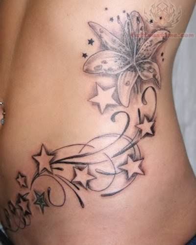 Black Outline Feminine Flower With Stars Tattoo Design For Side Rib