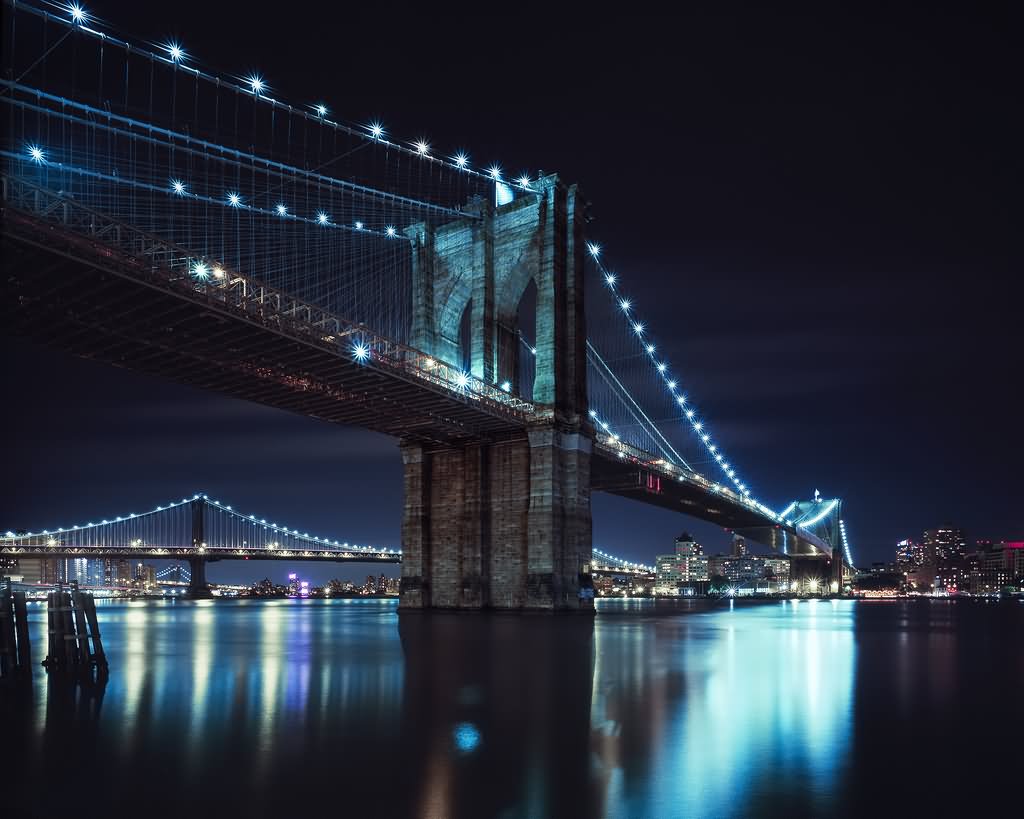 Blue Lights On Brooklyn Bridge At Night
