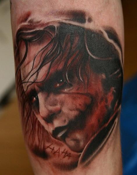 Brown Ink Joker Head Tattoo