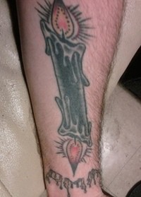 Candle Burning At Both Ends Tattoo on Arm