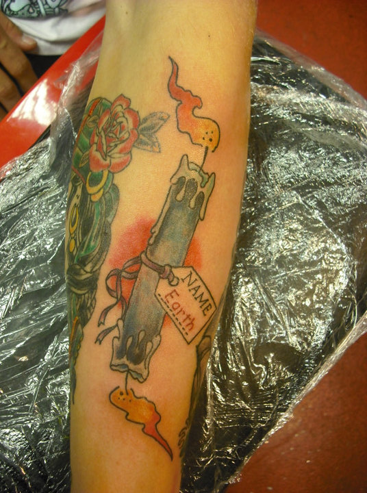Candle Burning At Both Ends with Banner Name Earth Tattoo on Forearm