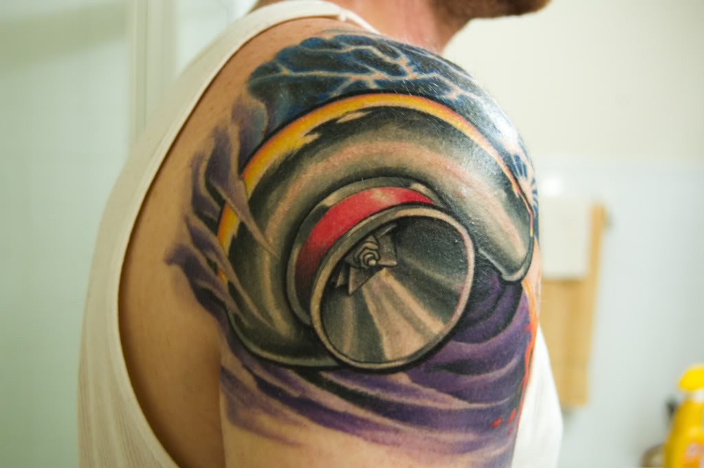 Car Themed Tattoo On Right Shoulder