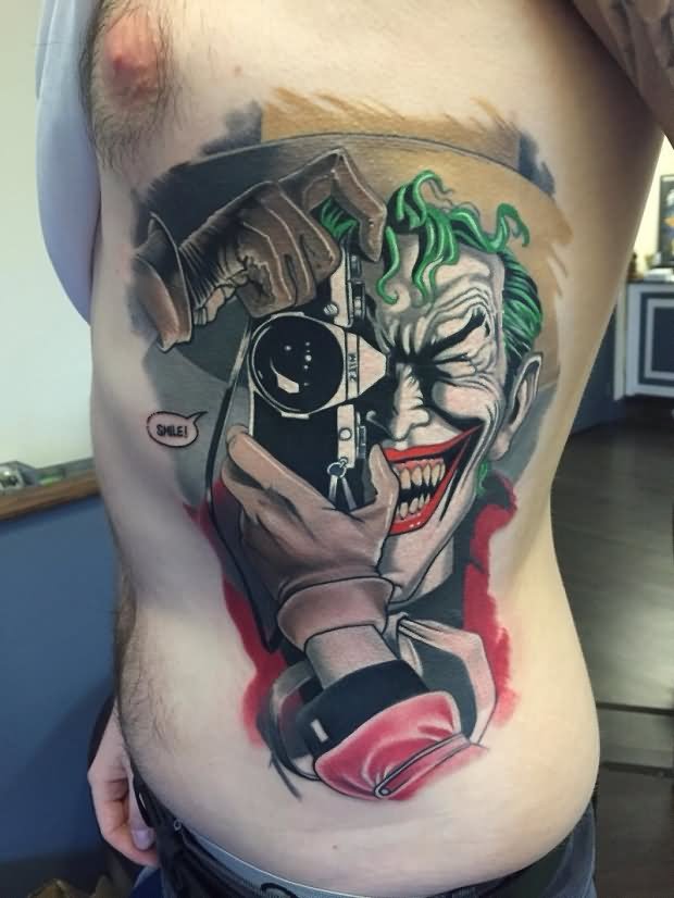 Color Ink Joker With Camera Tattoo On Side Rib