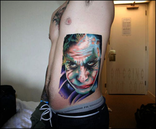 Color Joker Tattoo On Man Side Rib