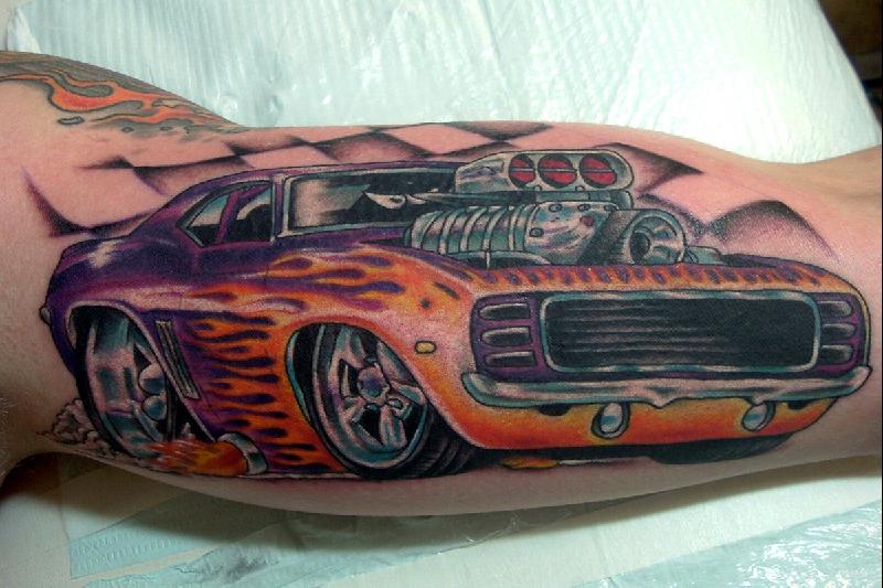 Colored Camaro Car Tattoo On Muscles.