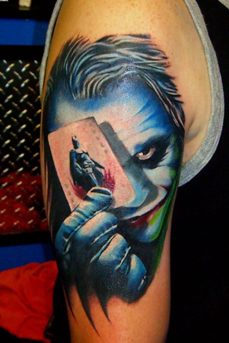 Colored Joker Head With Batman Car Tattoo On Half Sleeve