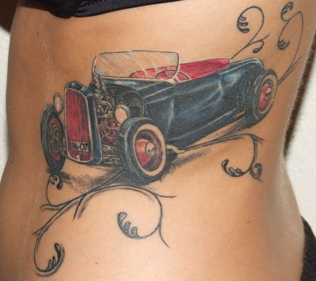 Colored Old Traditional Car Tattoo On Side Rib
