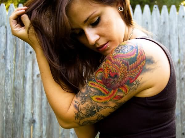 Colorful Feminine Flower Tattoo On Girl Left Half Sleeve