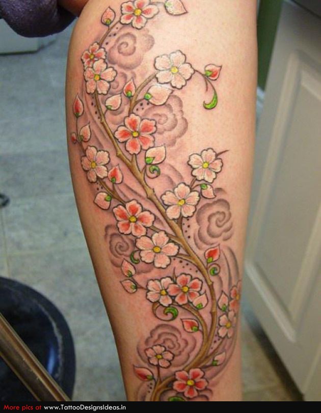 Colorful Feminine Flowers Tattoo Design For Leg