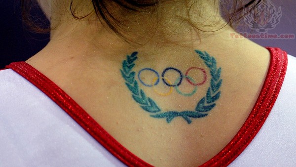 Colorful Olympic Symbol Tattoo On Girl Back Neck