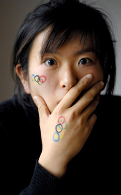 Colorful Olympic Symbol Tattoo On Girl Hand And Face