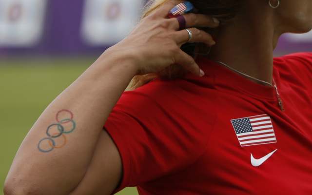 Colorful Olympic Symbol Tattoo On Girl Right Forearm