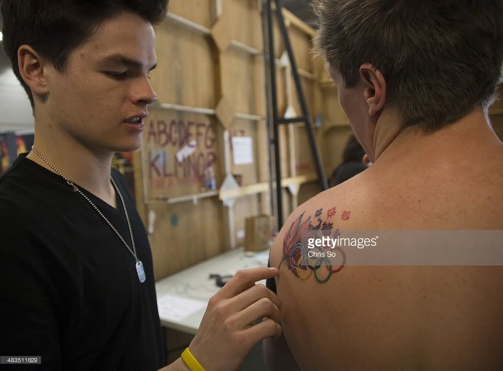Colorful Olympic Symbol Tattoo On Man Left Back Shoulder