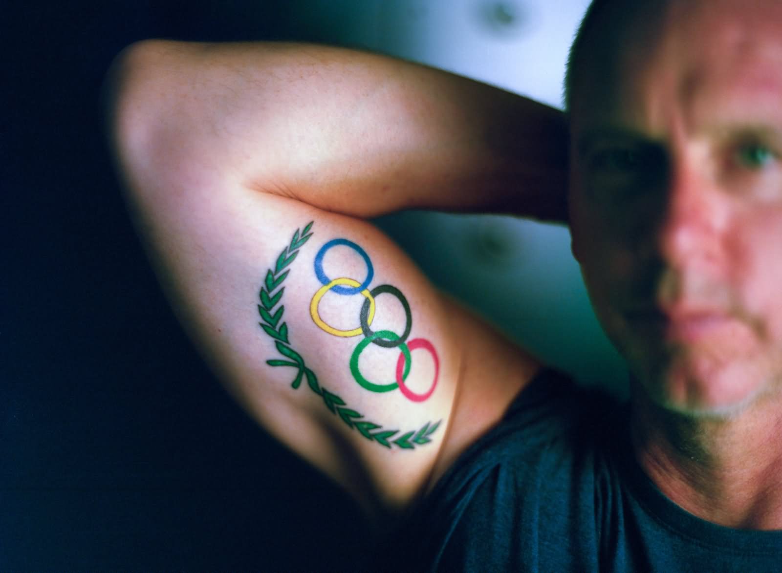 Colorful Olympic Symbol Tattoo On Right Bicep