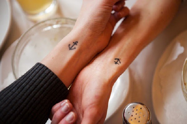 Couple With Anchor Wrist Tattoos