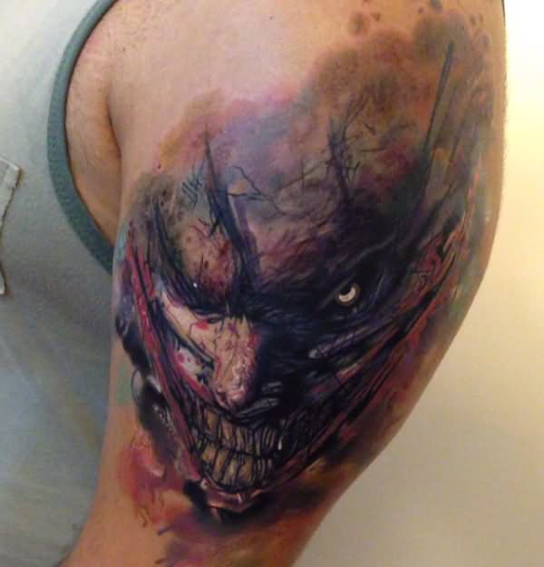 Evil Joker Tattoo On Left Shoulder