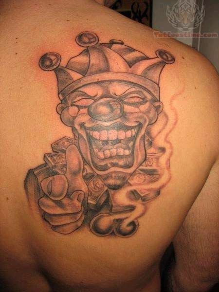 Evil Joker Tattoo On Right Back Shoulder