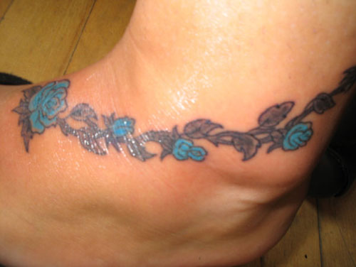 Feminine Flowers Tattoo Design For Ankle