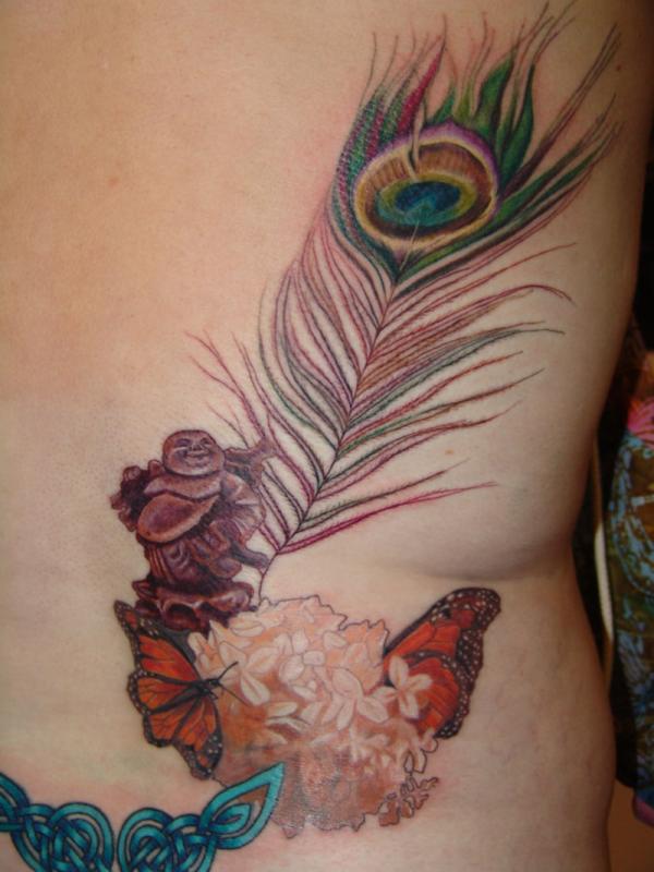 Feminine Flowers With Peacock Feather Tattoo Design