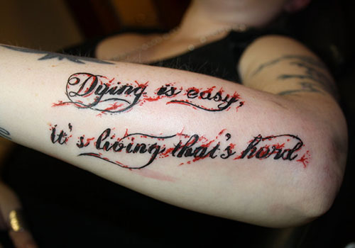 Feminine Script Tattoo On Left Arm