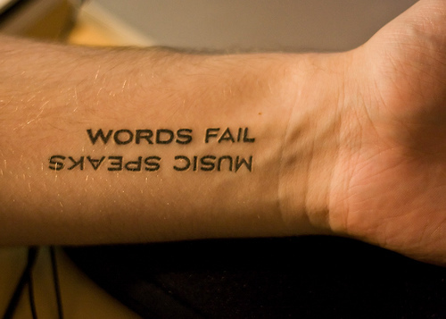 Feminine Script Tattoo On Wrist