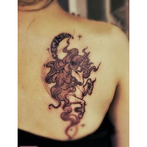 Feminine Unicorn With Half Moon Tattoo On Right Back Shoulder