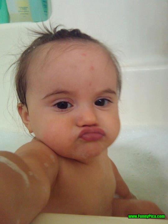 Funny Little Baby Making Duck Face Image