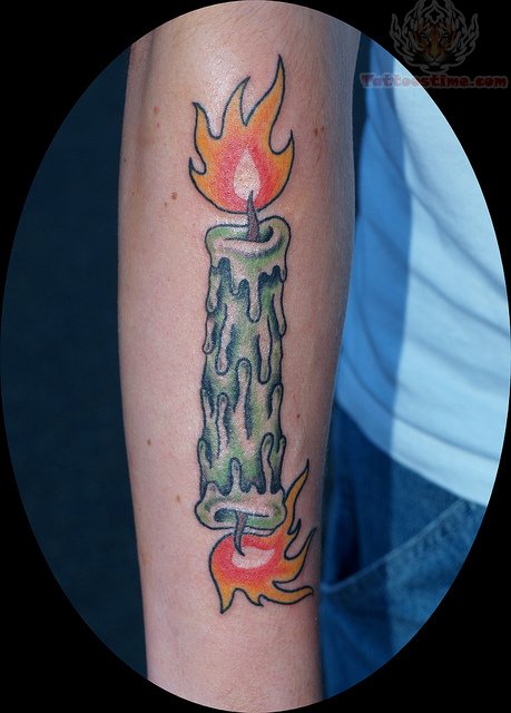 Green Candle Burning At Both Ends Tattoo on Forearm 2