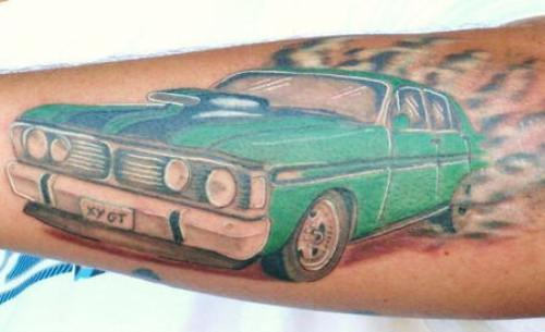 Green Car Tattoo On Arm