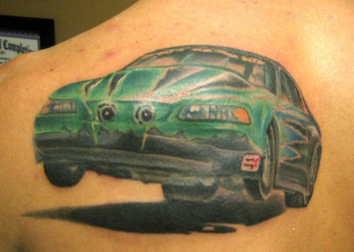 Green Ink Muscle Car Tattoo On Upper Back