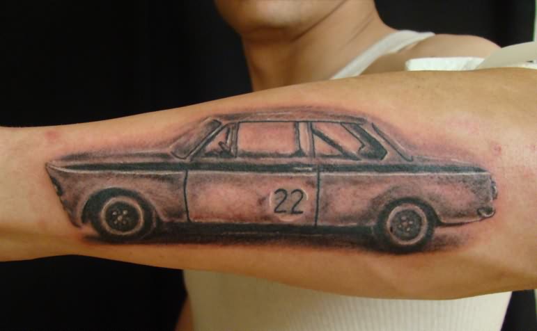 Grey Ink Car Tattoo On Man Left Arm
