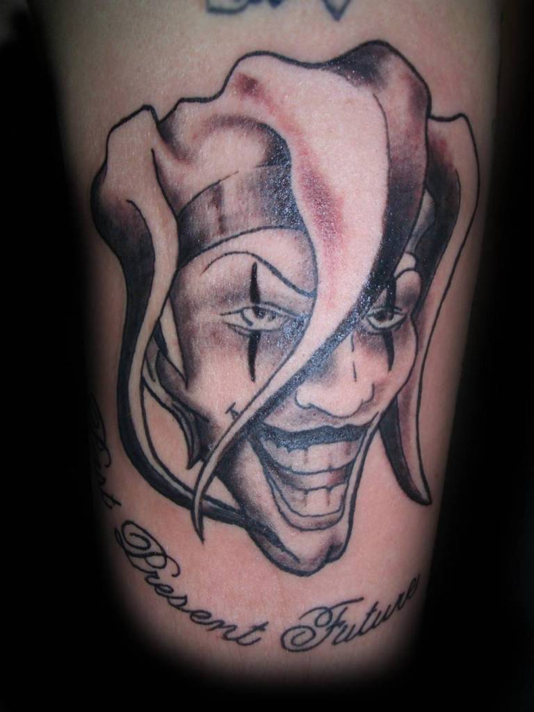 Grey Ink Cool Joker Head Tattoo