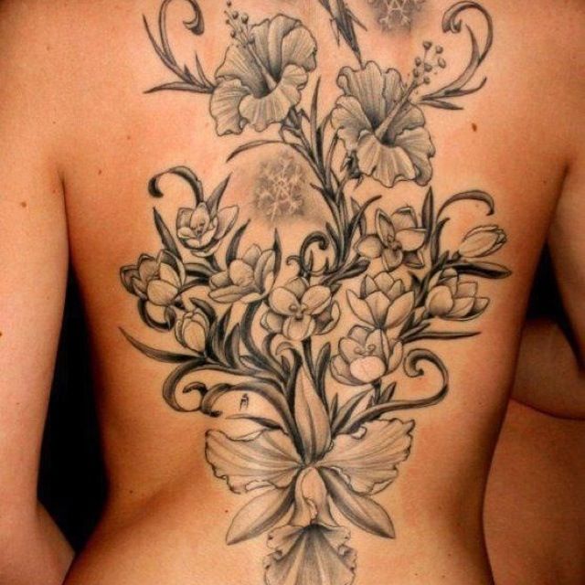 Grey Ink Feminine Flowers Tattoo On Girl Full Back