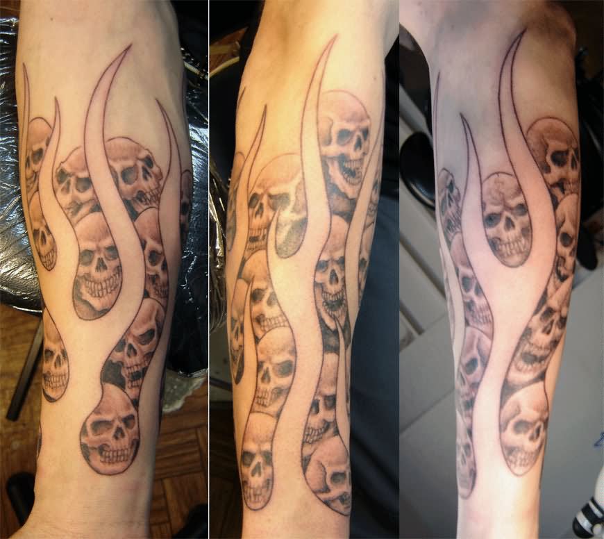 Grey Ink Fire And Flame Tattoo On Forearm