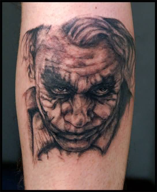 Grey Ink Joker Tattoo On Leg