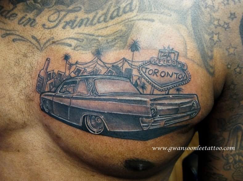 Grey Ink Toronto Lowride Car Tattoo On Man Chest