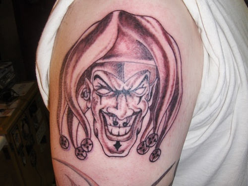 Grey Joker Tattoo On Man Right Shoulder